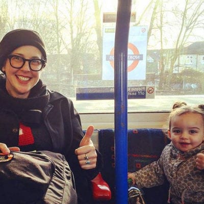 Heather Reynolds on bus with child