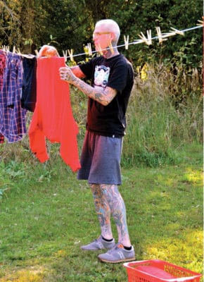 Mike Giant hanging out laundry