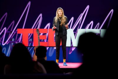 Beatie-Wolfe-on-TEDMED-Stage---talking_The Art of Imprinting In The Digital Age by Beatie Wolfe