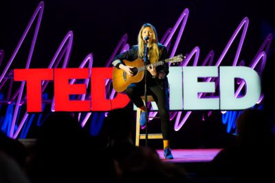 Beatie-Wolfe-on-TEDMED-stage---Boston-2020-(1)_The Art of Imprinting In The Digital Age by Beatie Wolfe